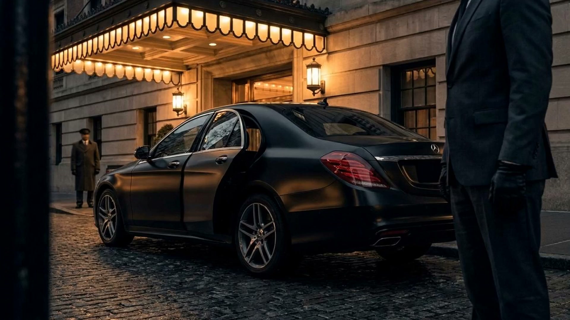 BRiZ chauffeur waiting at the porte-cochère of a Manhattan hotel